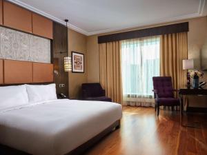 Postel nebo postele na pokoji v ubytování Hilton Baku
