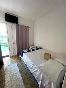 Postel nebo postele na pokoji v ubytování Pousada Vila Nativa