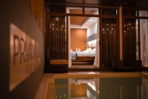 Postel nebo postele na pokoji v ubytování Privada Villa Siargao