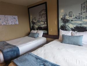 Krevet ili kreveti u jedinici u objektu Southern Comfort Hotel
