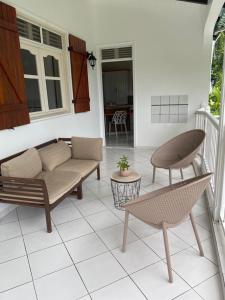 Posezení v ubytování Haut de villa chez Lise