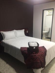 Кровать или кровати в номере Casa Mar Riohacha