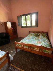 Giường trong phòng chung tại Casa Vieja Bodega