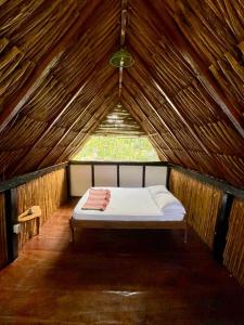 Una cama o camas en una habitación de Casa Rio - Palomino