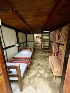 Una cama o camas cuchetas en una habitación  de Casa Rio - Palomino