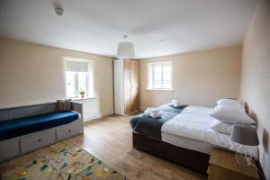 A bed or beds in a room at Rock Farm Slane - Limehouse