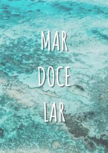 a picture of the ocean with the words mar dog liar at Pousada Villa do Mar in Itaparica Town