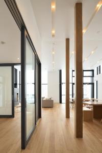 an open office with large glass doors and wooden floors at ZEN - Vacation STAY 74302v in Niseko