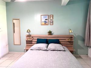 Postel nebo postele na pokoji v ubytování Appartement Le Colibri avec jacuzzi