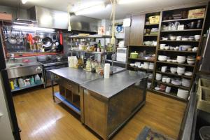 a kitchen with a counter in the middle of it at TRAX NUNOBA - Vacation STAY 02612v in Yuzawa