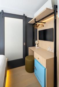 Kuchyň nebo kuchyňský kout v ubytování Little Charlie Hotel
