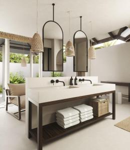 a bathroom with a sink and a mirror at Villa Haven Resort Maldives - 50 Percentage Off Seaplane for 4 Nights and Above in Maamigili
