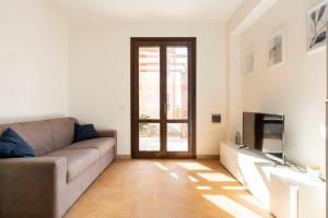 A television and/or entertainment centre at Casa Vacanze Albarìa