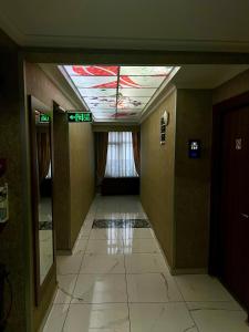 a hallway with a skylight in a building at Elit Palace Hotel in Istanbul