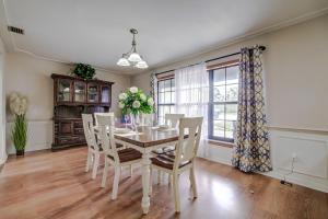 a dining room with a table and chairs at Tranquil Oasis Haven in Marion Oaks