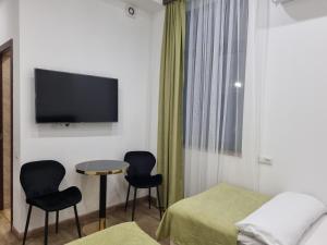 TV a/nebo společenská místnost v ubytování Day Inn hotel