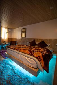 Postel nebo postele na pokoji v ubytování Darjeeling Guest House Deluxe