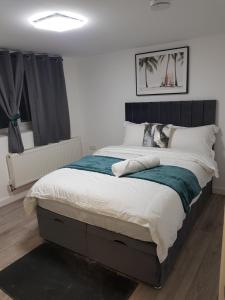 Ліжко або ліжка в номері Holiday Let - Entire modern home in Medway