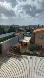 arial view of a roof of a house with a backyard at H5J - APT in Vila Nova de Gaia