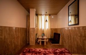 Posezení v ubytování Darjeeling Guest House Deluxe