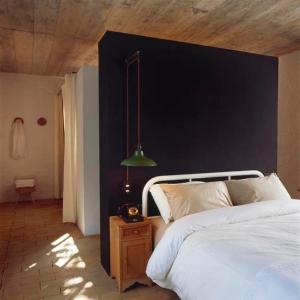 Ένα ή περισσότερα κρεβάτια σε δωμάτιο στο Maison Couturier, San Rafael, a Member of Design Hotels
