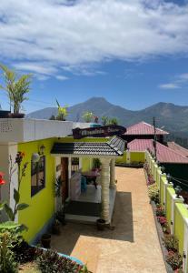 Casa con vistas a las montañas en Mountain cheers munnar en Munnar