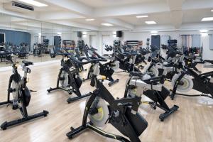 a gym with a lot of exercise bikes at Delta Hotels by Marriott Preston in Preston