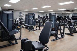 a gym with lots of treadmills and cardio equipment at Delta Hotels by Marriott Preston in Preston