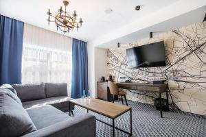 TV a/nebo společenská místnost v ubytování Hotel M23
