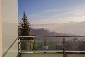 a balcony with a view of a mountain at Apartview Bukowa Apartments by Rent like home in Wisła