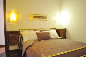 A bed or beds in a room at Casa Vacanze Mazzanti