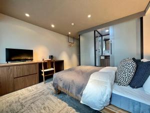 Cama o camas de una habitación en Lang Hotel Ueno 朝食付 #上野駅徒歩9分 #秋葉原浅草羽田&成田空港へ便利