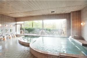 Bazén v ubytování GLOBAL RESORT NUKUI nebo v jeho okolí