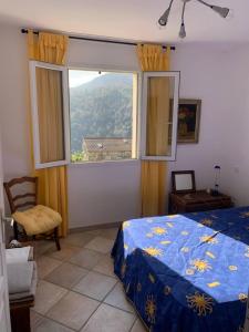 Posteľ alebo postele v izbe v ubytovaní Maison entre terre et mer Vue sur mer Grande terrasse