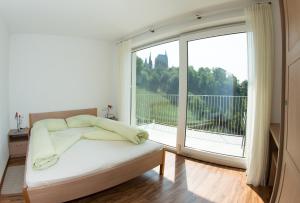 Posteľ alebo postele v izbe v ubytovaní Residence Fiegl