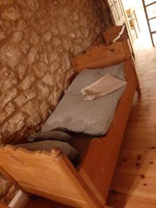 a wooden bunk bed in a room at Erlebnishof Bauernhof Ferienhaus 