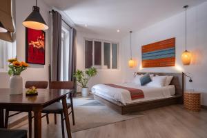 Giường trong phòng chung tại CIRCADIAN Airy Studio near Nguyen Hue