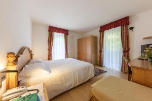Posteľ alebo postele v izbe v ubytovaní Hotel Plank