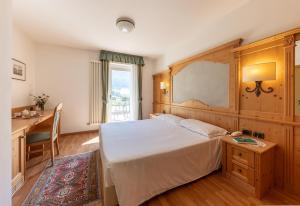 Posteľ alebo postele v izbe v ubytovaní Hotel Plank