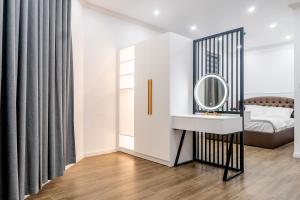 Postel nebo postele na pokoji v ubytování ROSA QUEEN HOTEL