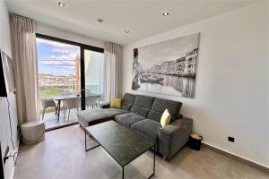 A seating area at White Lion Apartment Kallithea 1