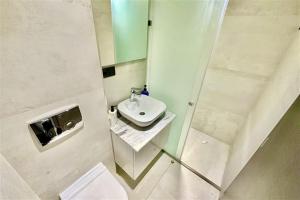 A bathroom at White Lion Apartment Kallithea 1