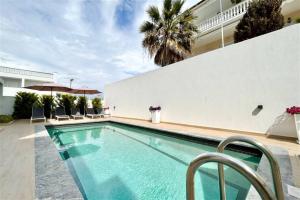The swimming pool at or close to White Lion Apartment Kallithea 1