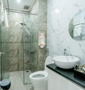 Koupelna v ubytování ROSA QUEEN HOTEL