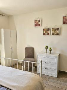Postel nebo postele na pokoji v ubytování Corte Soave Apartment