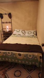 מיטה או מיטות בחדר ב-Santa Inés Antigua