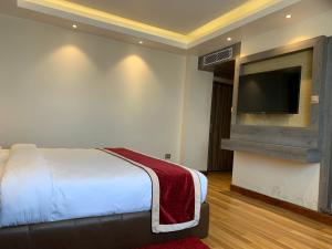 Voodi või voodid majutusasutuse Hotel Flower toas