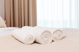 A bed or beds in a room at Remarkable 2BR+storage in JBR with Sea View
