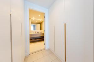 A bed or beds in a room at Remarkable 2BR+storage in JBR with Sea View
