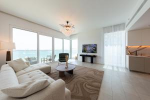A television and/or entertainment centre at Remarkable 2BR+storage in JBR with Sea View
